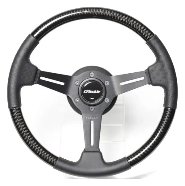 Kierownica sportowa GReddy Sports "Real Carbon" (Wklęsła 47 mm), Czarne ramiona - 340 mm