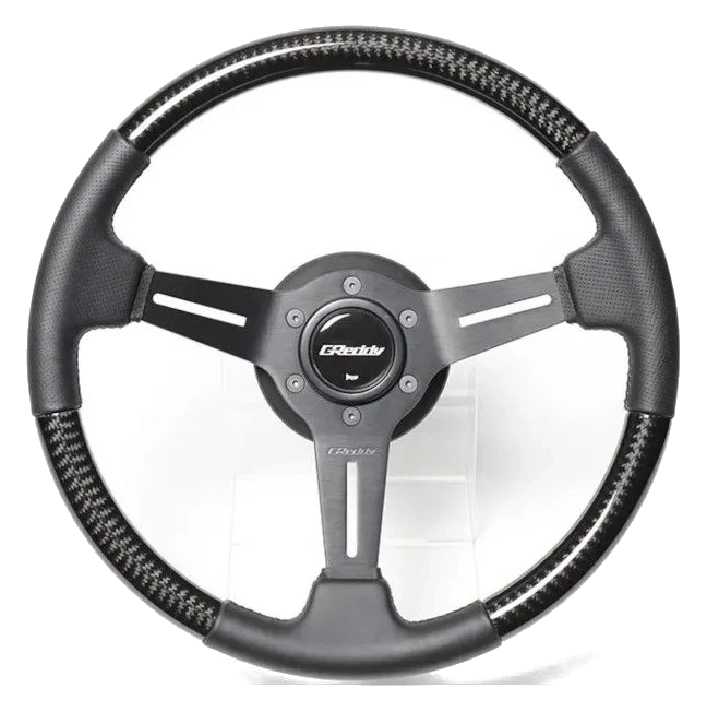 Kierownica sportowa GReddy Sports "Real Carbon" (Wklęsła 47 mm), Czarne ramiona - 340 mm